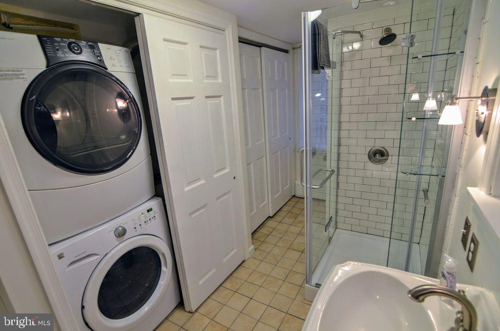 1029 30th Street Northwest Washington, DC 20007 - Photo 32 of 40 a utility room with dryer and washer