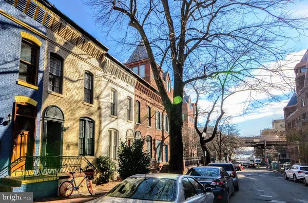 a view of a building with car windows