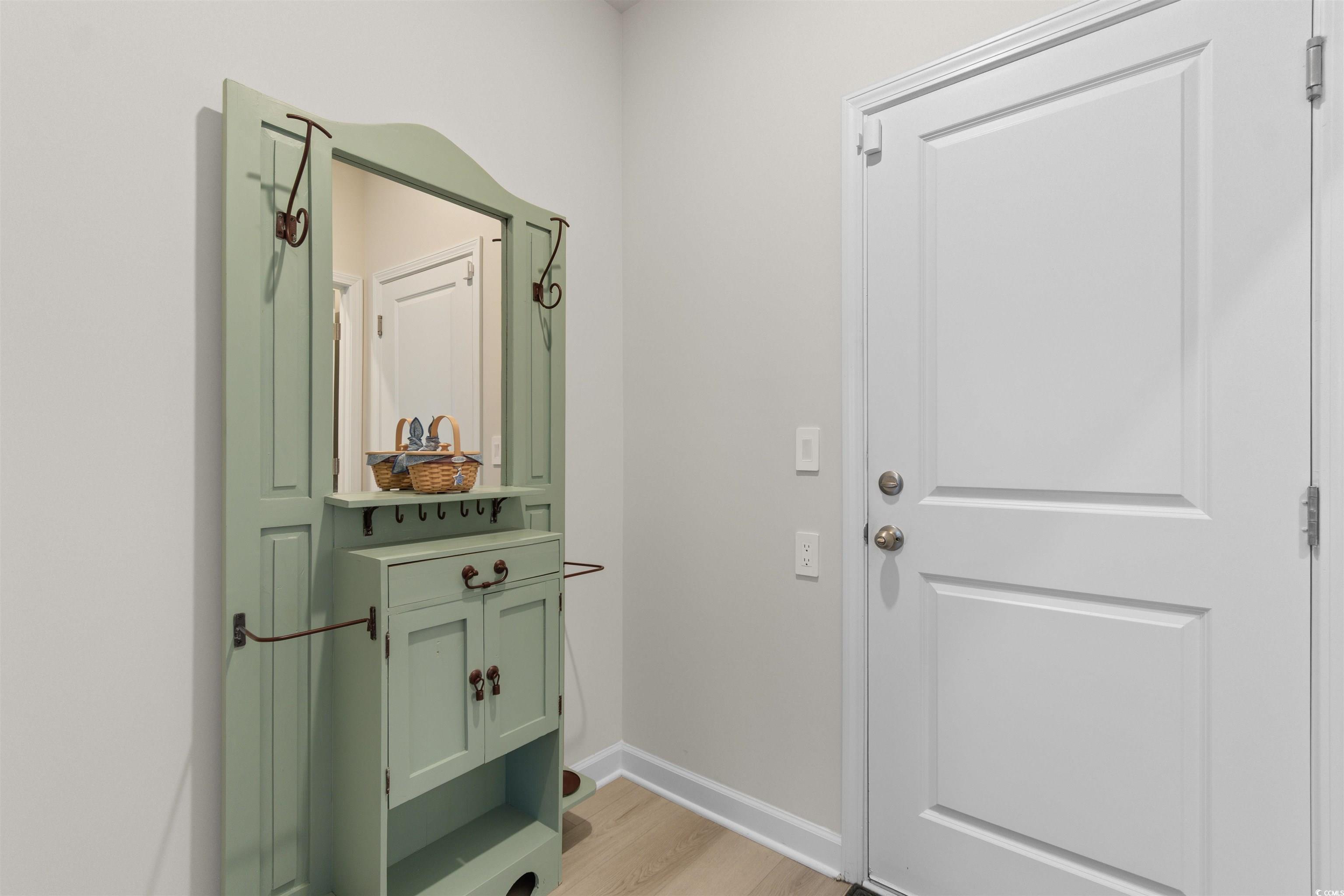 4059 Bayhill Street Myrtle Beach, SC 29579 - Photo 17 of 40 Entryway featuring wood finished floors and baseboards
