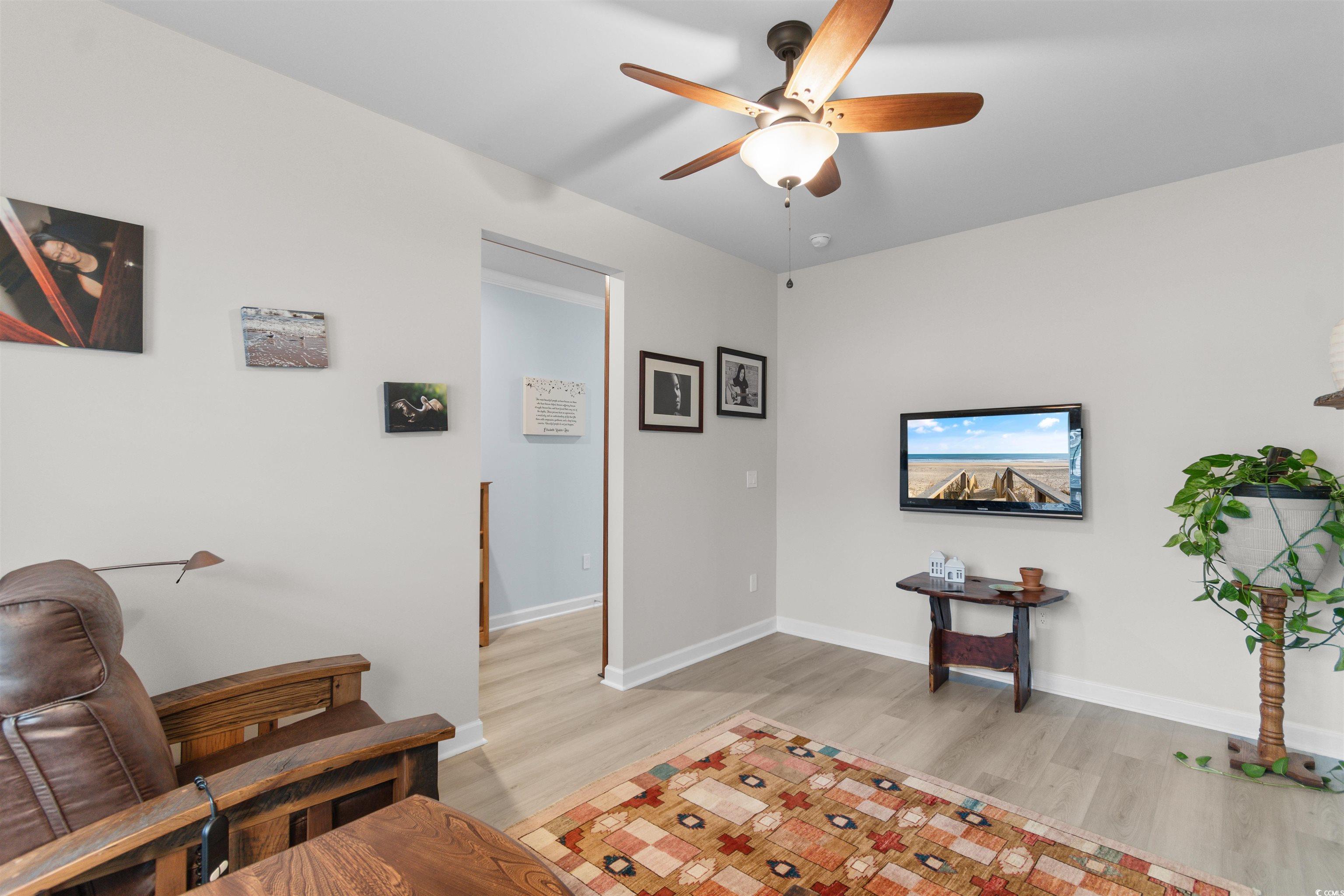 4059 Bayhill Street Myrtle Beach, SC 29579 - Photo 19 of 40 Sitting room featuring light wood-type flooring and a ceiling fan