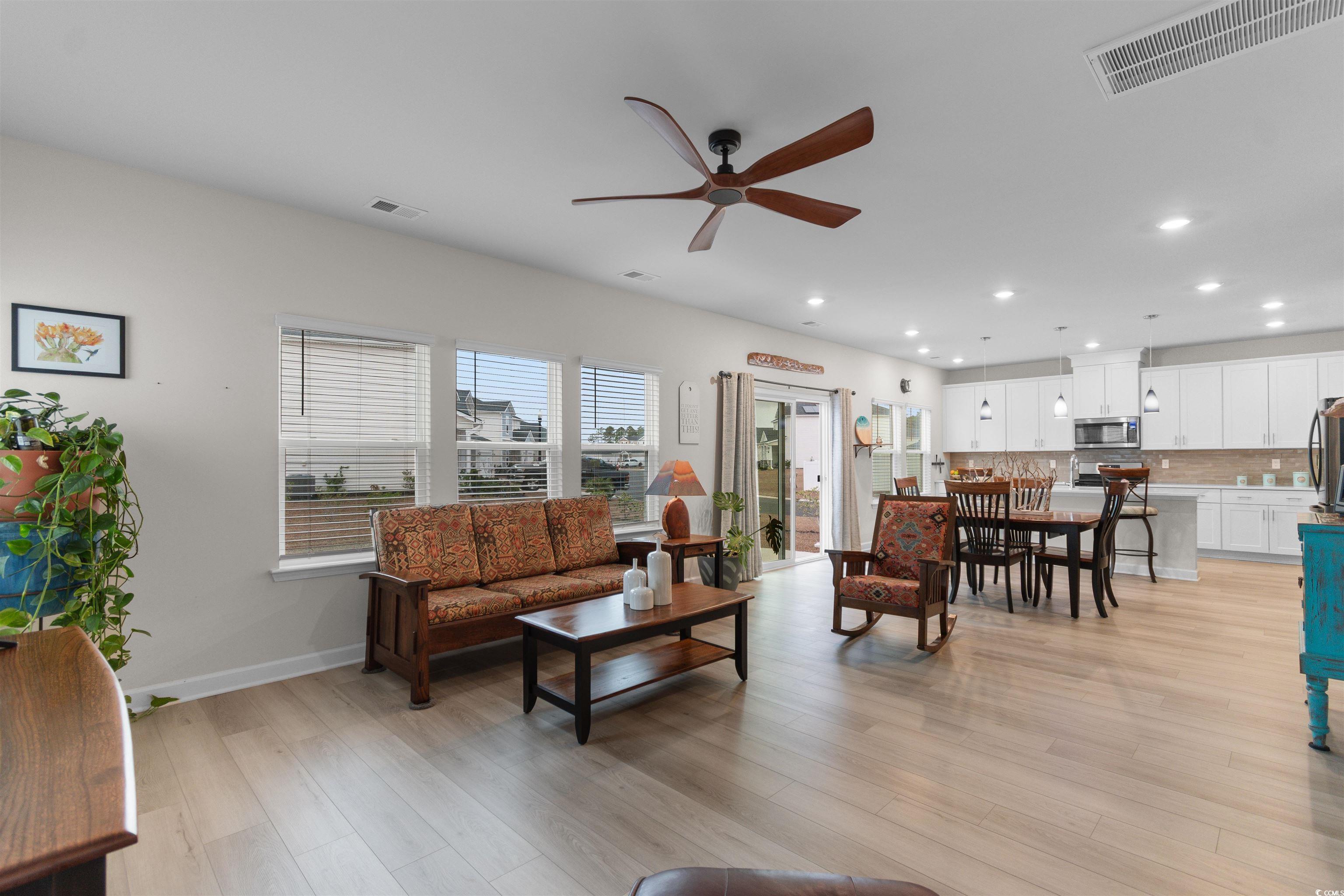 4059 Bayhill Street Myrtle Beach, SC 29579 - Photo 31 of 40 Living room with light wood finished floors, a ceiling fan, and recessed lighting