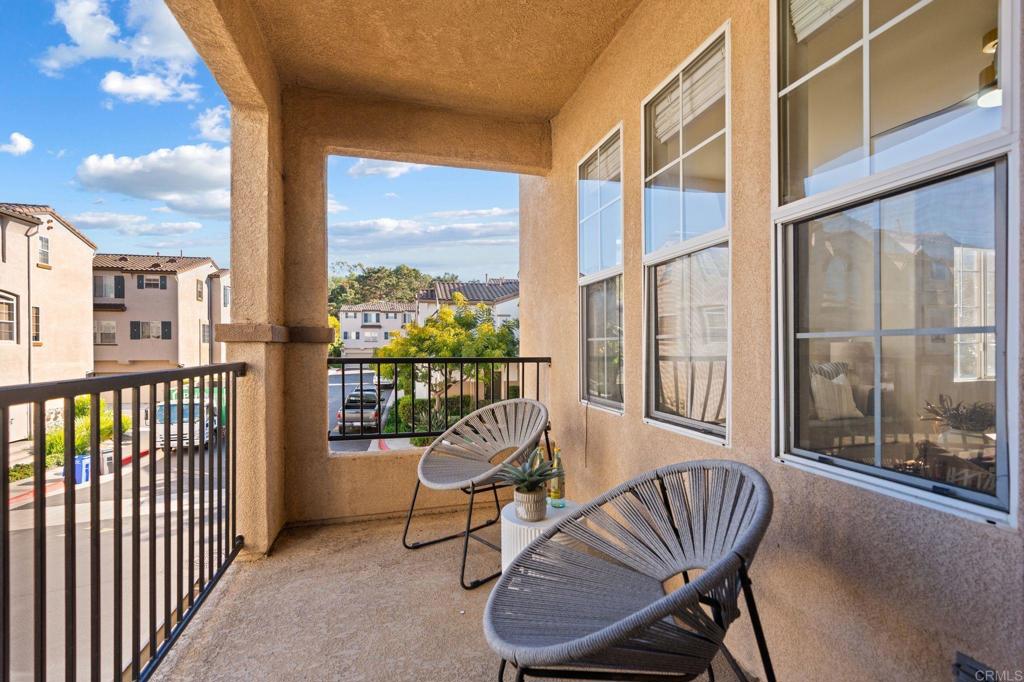 3114 Via Puerta Carlsbad, CA 92009 - Photo 11 of 39 a view of a chair and table in the balcony
