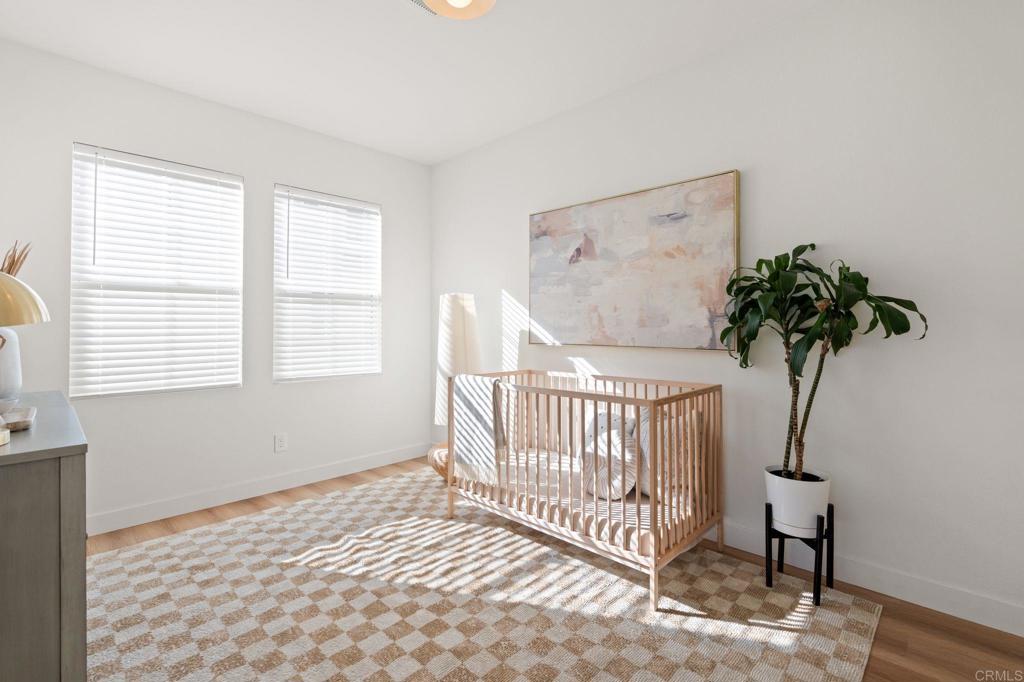3114 Via Puerta Carlsbad, CA 92009 - Photo 15 of 39 a bedroom with a bed and a window