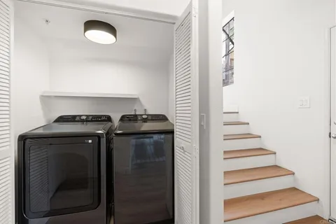 a view of entryway with wooden floor