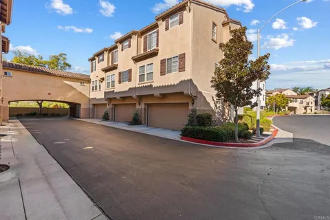 a view of a building with a street