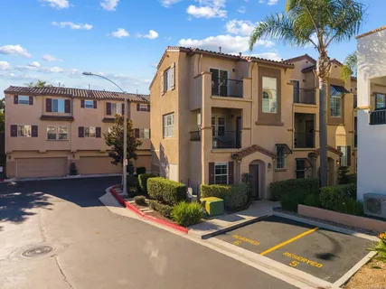 a view of a street with a building in the background