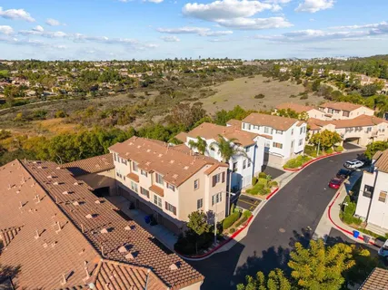 a view of a city with an ocean view