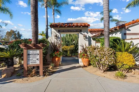 an outdoor space with lots of trees