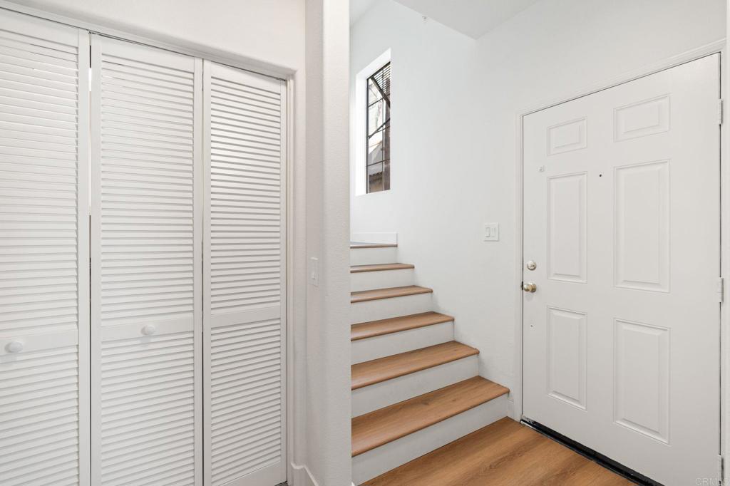 3114 Via Puerta Carlsbad, CA 92009 - Photo 5 of 39 a view of a room with stairs and a window
