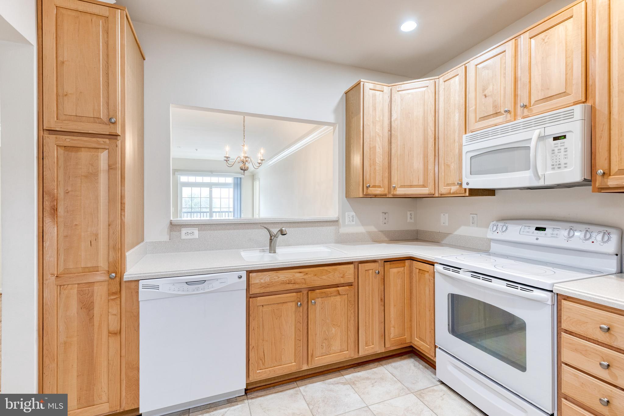7305 Brookview Road, Unit 308 Elkridge, MD 21075 - Photo 11 of 28 Wood cabinets w/plenty of storage