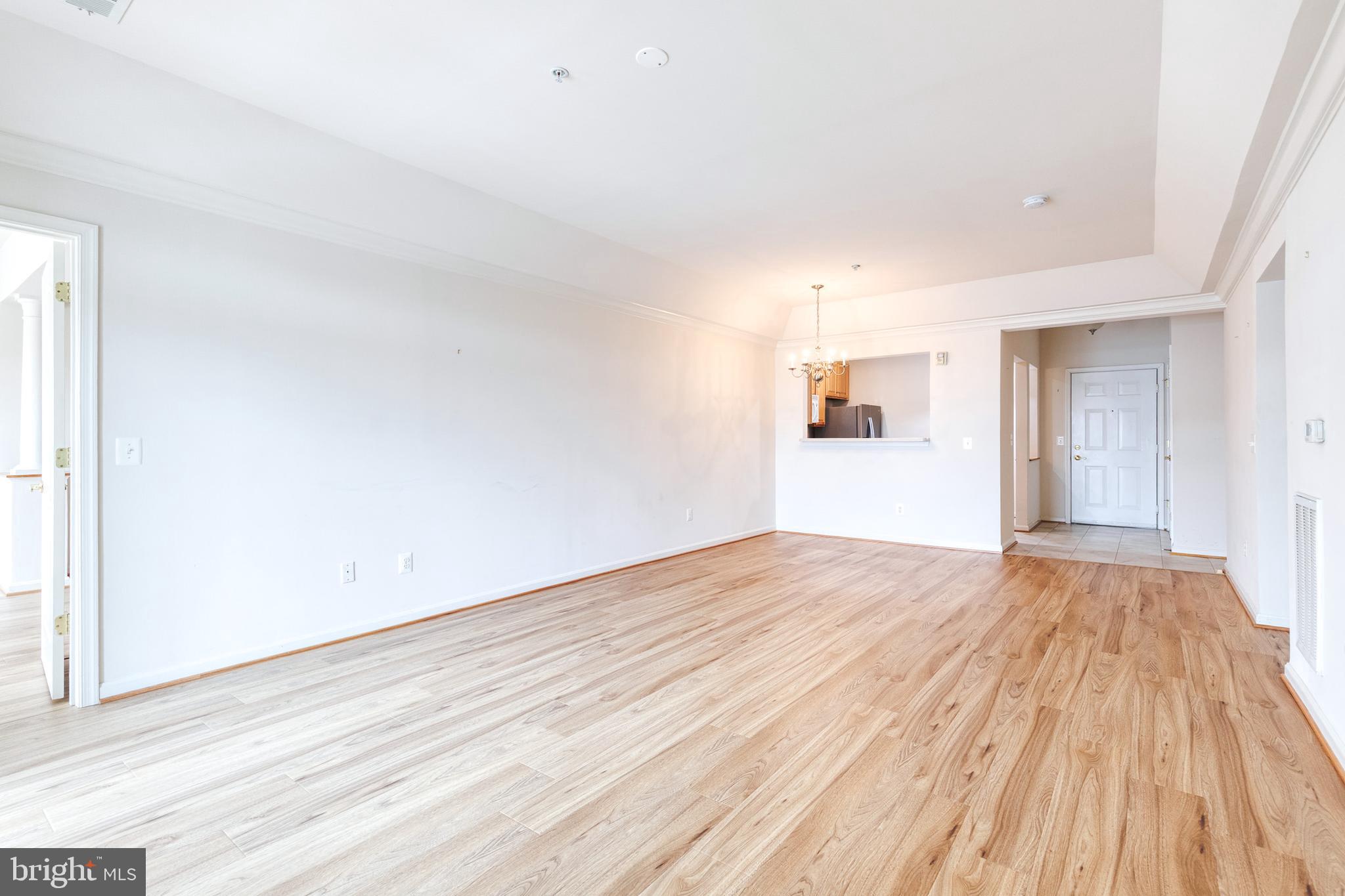 7305 Brookview Road, Unit 308 Elkridge, MD 21075 - Photo 6 of 28 View into kitchen from the back of living area