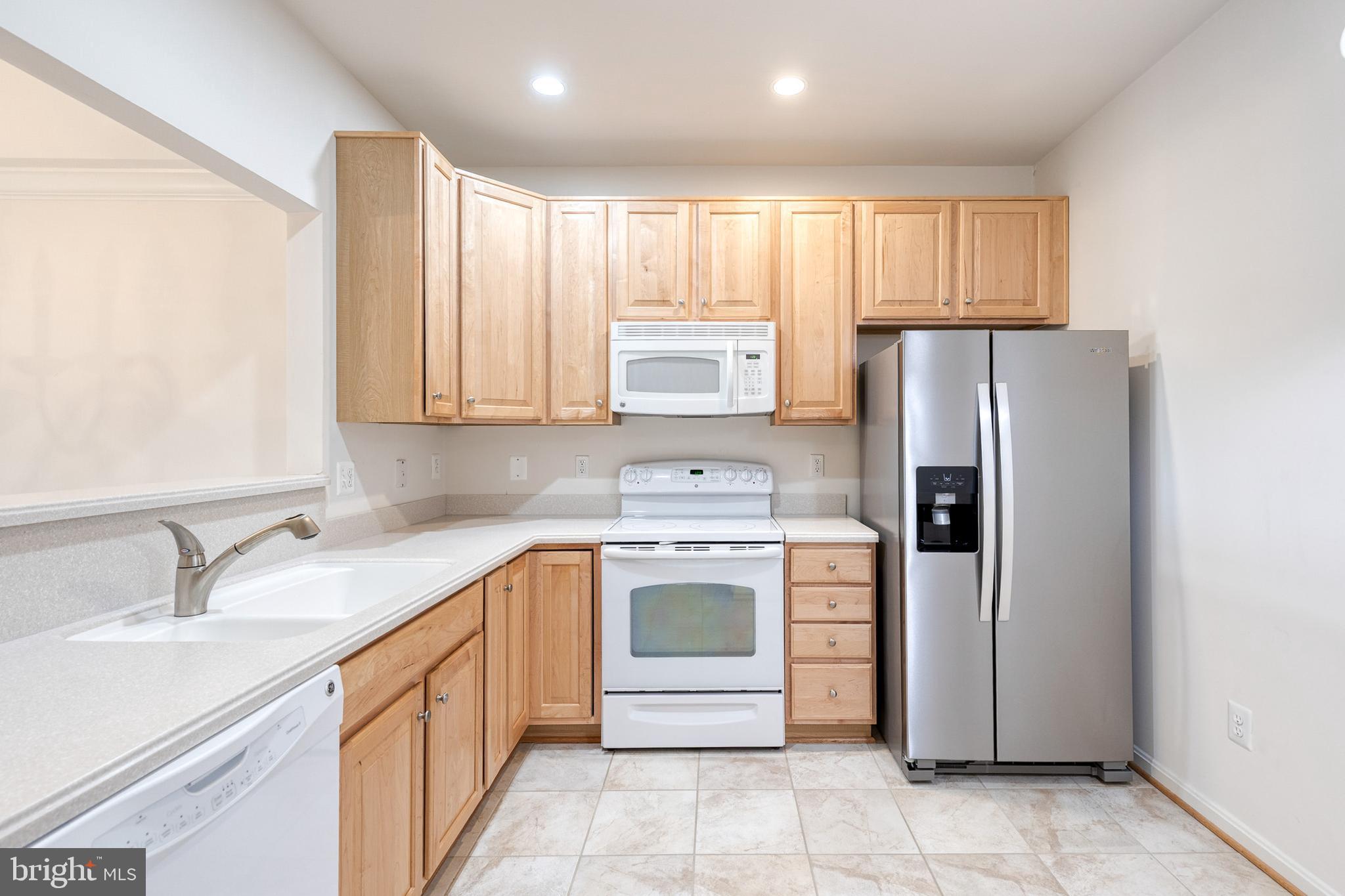 7305 Brookview Road, Unit 308 Elkridge, MD 21075 - Photo 10 of 28 Eat-in kitchen has abundant cabinet space