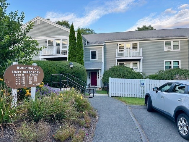 48 Evergreen Road, Unit 313 Leeds, MA 01053 - Photo 1 of 19 a house view with a garden space