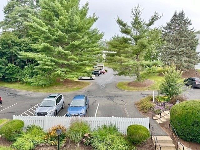 48 Evergreen Road, Unit 313 Leeds, MA 01053 - Photo 17 of 19 a view of a lake from a outdoor space