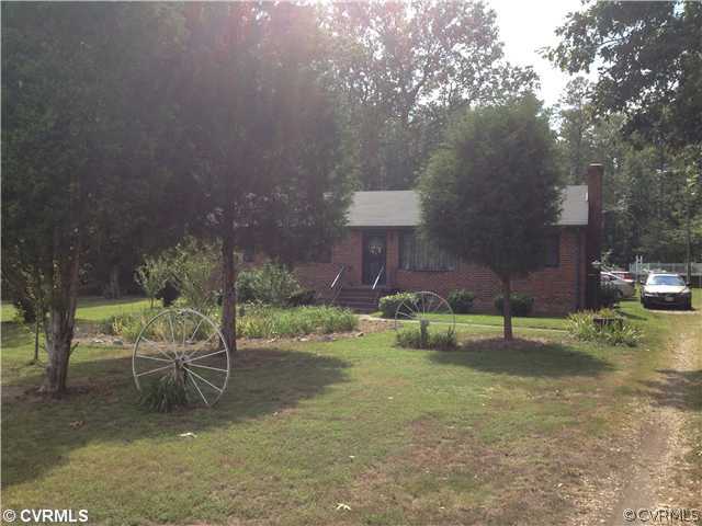 8392 Buffin Road Henrico, VA 23231 - Photo 8 of 9 a view of house with a backyard