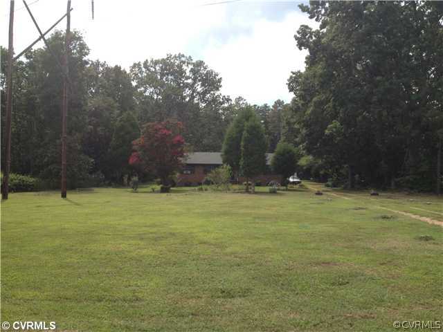 8392 Buffin Road Henrico, VA 23231 - Photo 9 of 9 a view of outdoor space with deck and yard