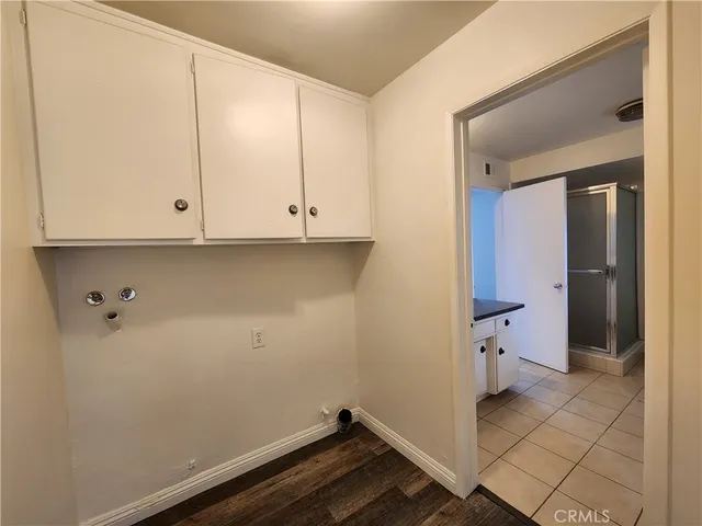 a view of room with washer and dryer