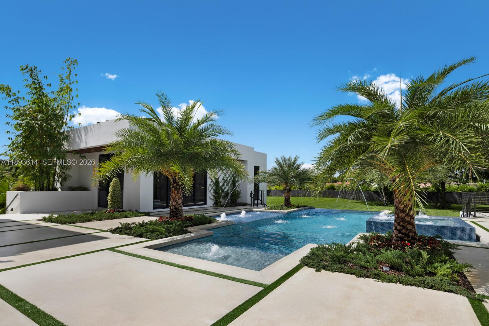 9900 Southwest 125th Avenue Miami, FL 33186 - Photo 23 of 83 a view of a house with palm trees