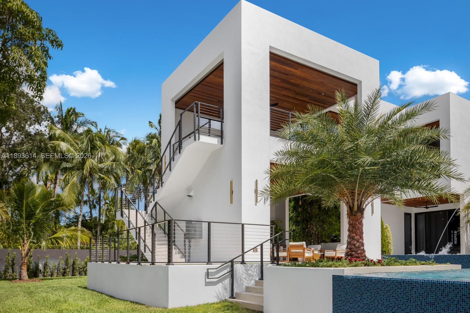 9900 Southwest 125th Avenue Miami, FL 33186 - Photo 32 of 83 a view of house with yard and potted plants