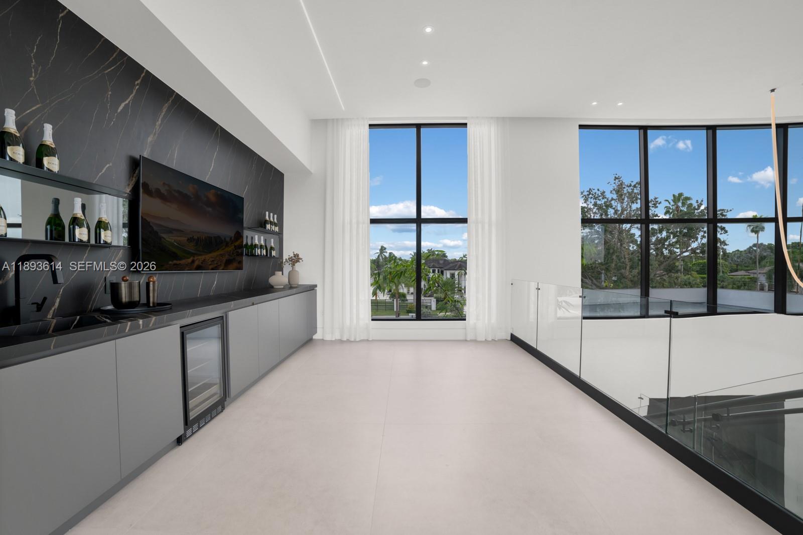 9900 Southwest 125th Avenue Miami, FL 33186 - Photo 42 of 83 a large kitchen with a large window and stainless steel appliances