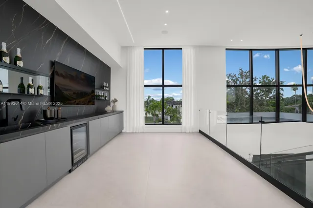 a view of a room with a large window