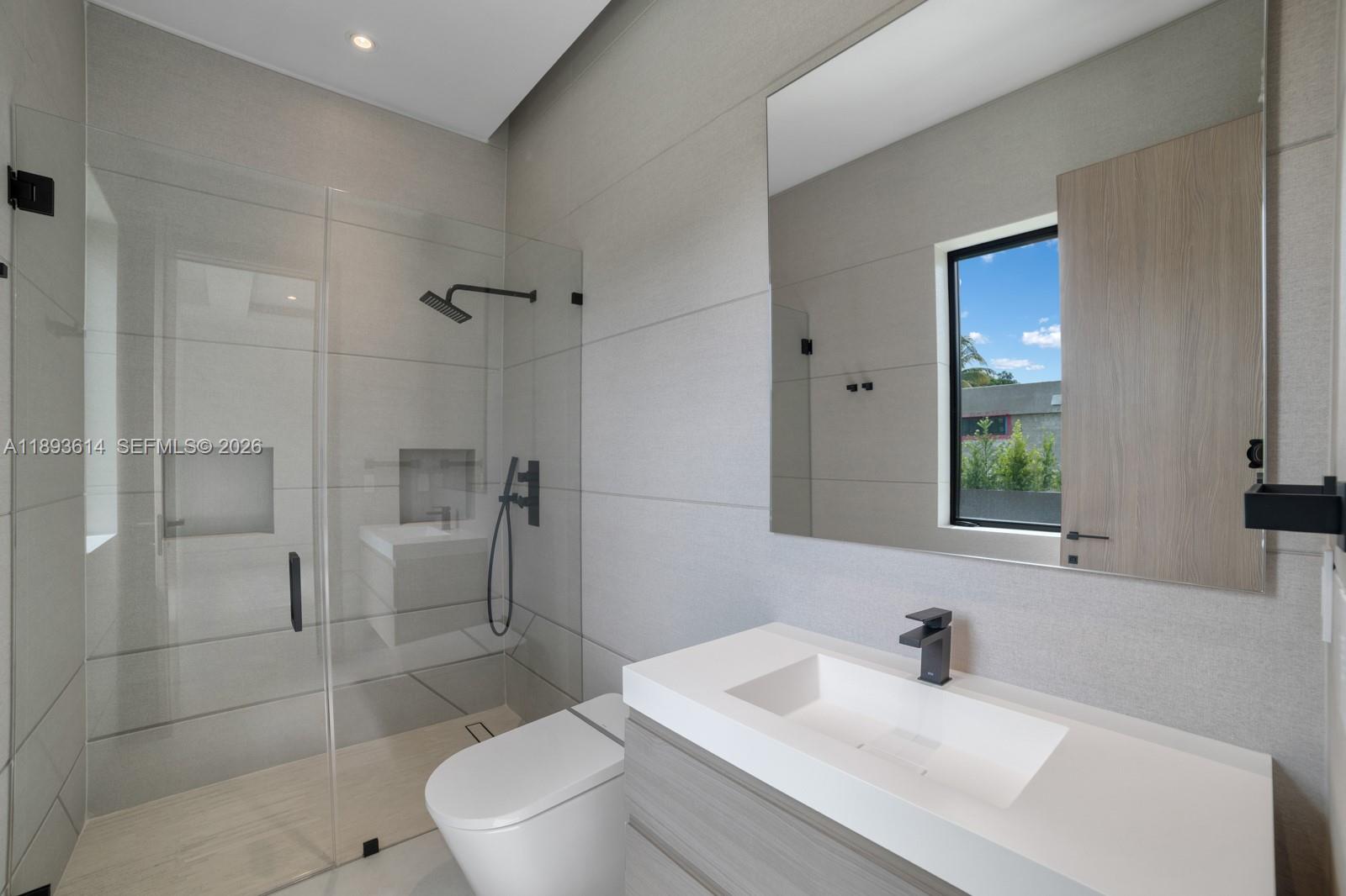 9900 Southwest 125th Avenue Miami, FL 33186 - Photo 53 of 83 a bathroom with a sink toilet and shower