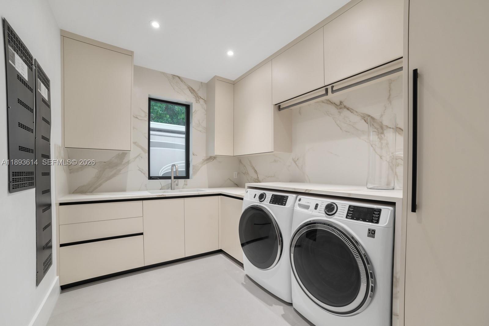 9900 Southwest 125th Avenue Miami, FL 33186 - Photo 59 of 83 a utility room with dryer and washer