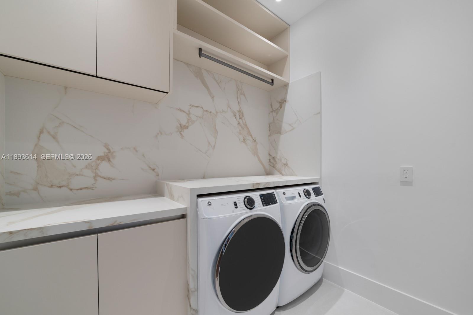 9900 Southwest 125th Avenue Miami, FL 33186 - Photo 71 of 83 a utility room with dryer and washer