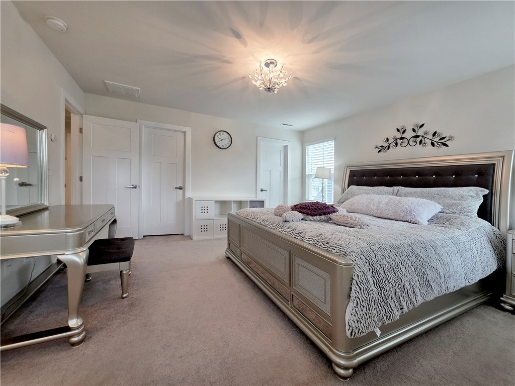 224 Bronson Ridge Anderson, SC 29621 - Photo 16 of 42 Luxurious bedroom retreat, designed for comfort and tranquility.