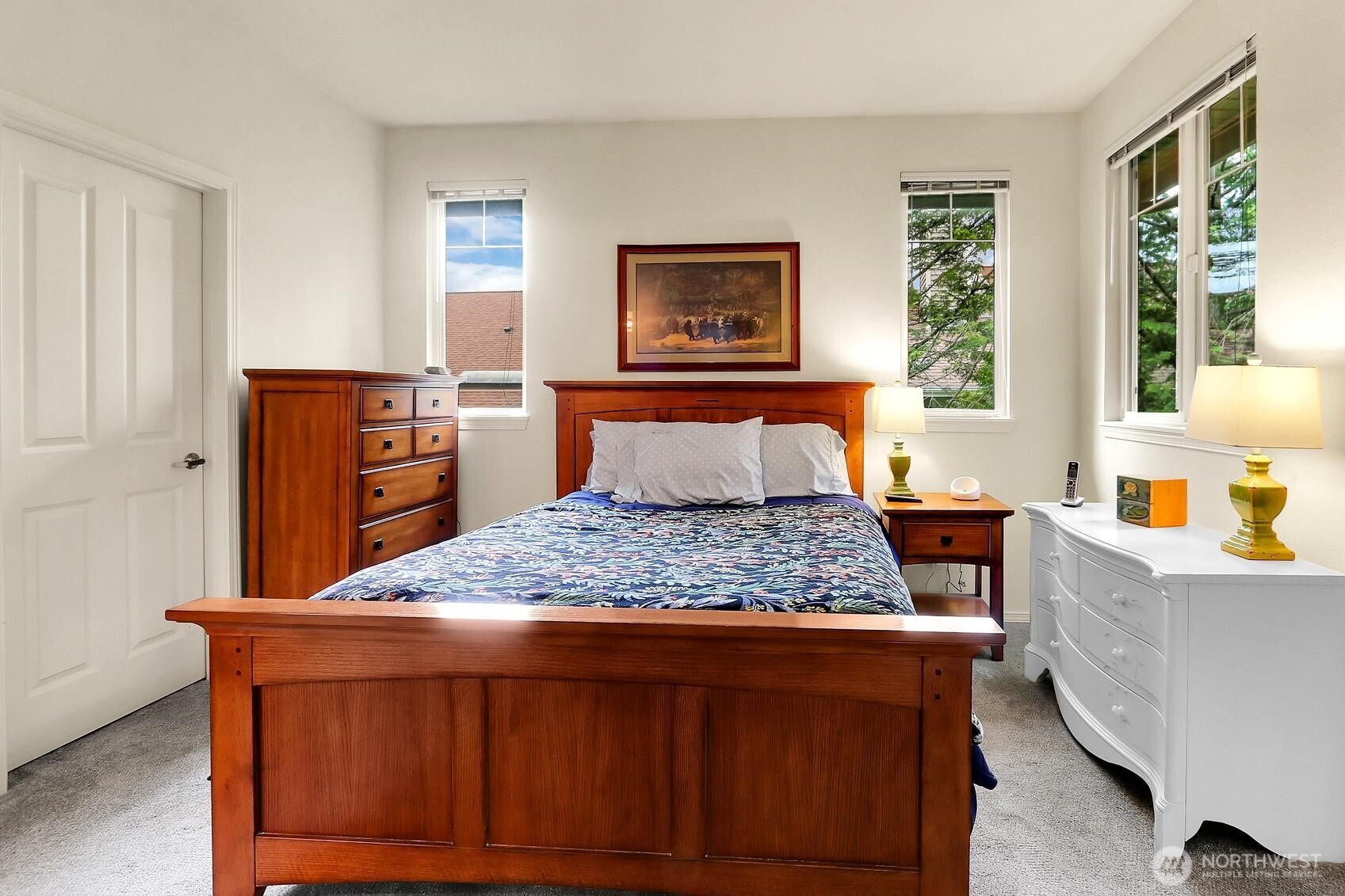 1500 South 18th Street, Unit F202 Renton, WA 98055 - Photo 11 of 20 a bedroom with a bed and wooden floor