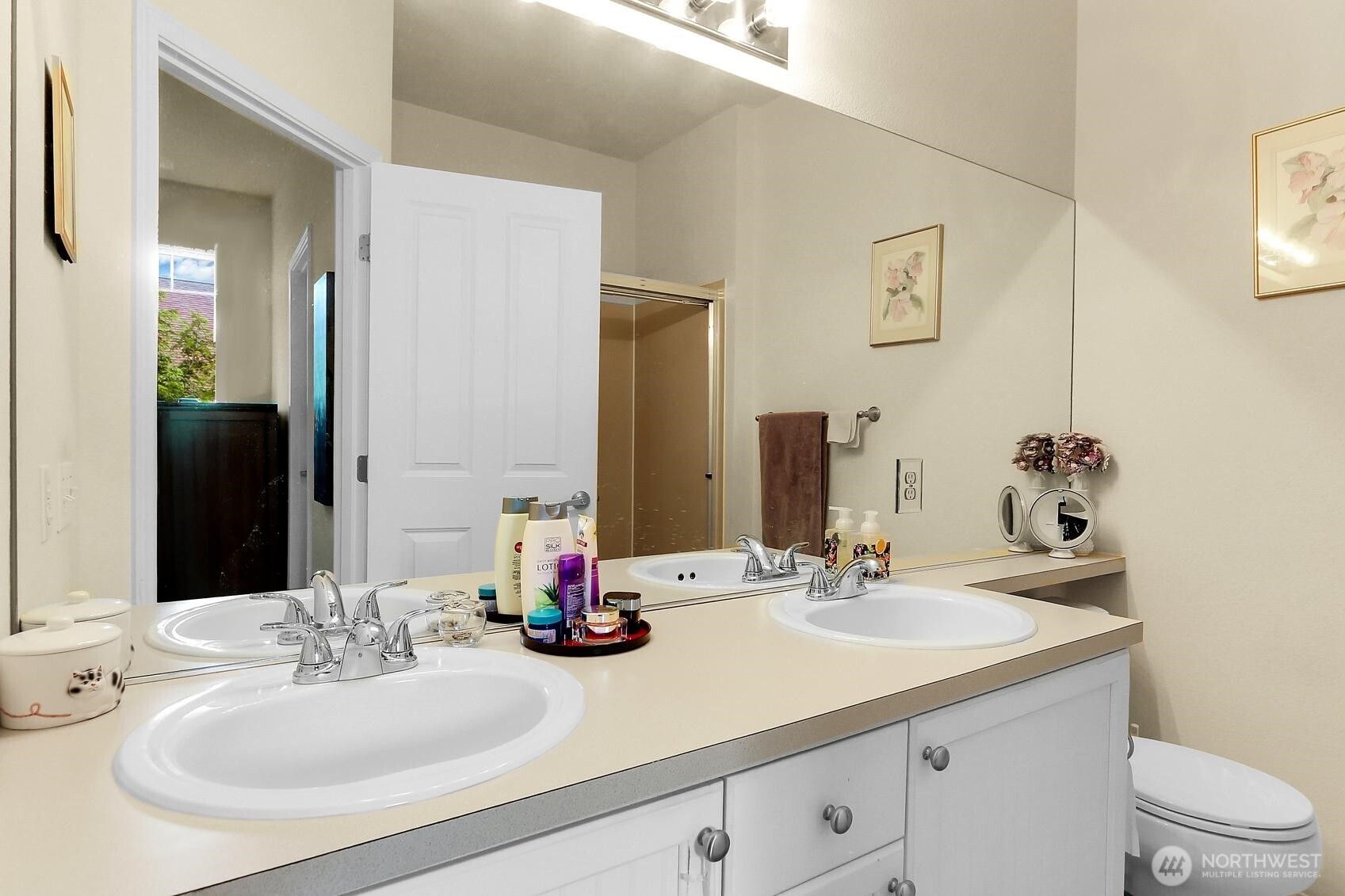 1500 South 18th Street, Unit F202 Renton, WA 98055 - Photo 14 of 20 a bathroom with a sink and a mirror