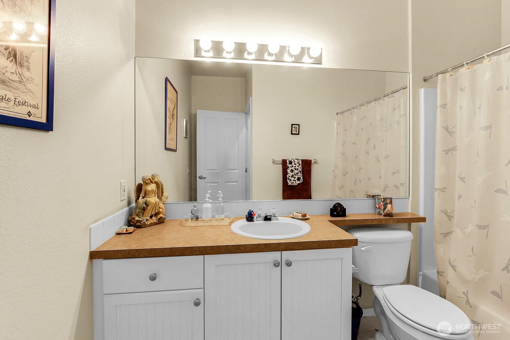 1500 South 18th Street, Unit F202 Renton, WA 98055 - Photo 17 of 20 a bathroom with a sink and a mirror