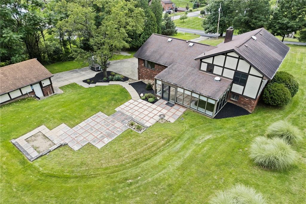 94 Ohare Road Canonsburg, PA 15317 - Photo 42 of 50 A backyard built for enjoying! Expansive patio space, a level lawn, mature landscaping, and plenty of room to entertain, relax, or make the outdoor space your own.