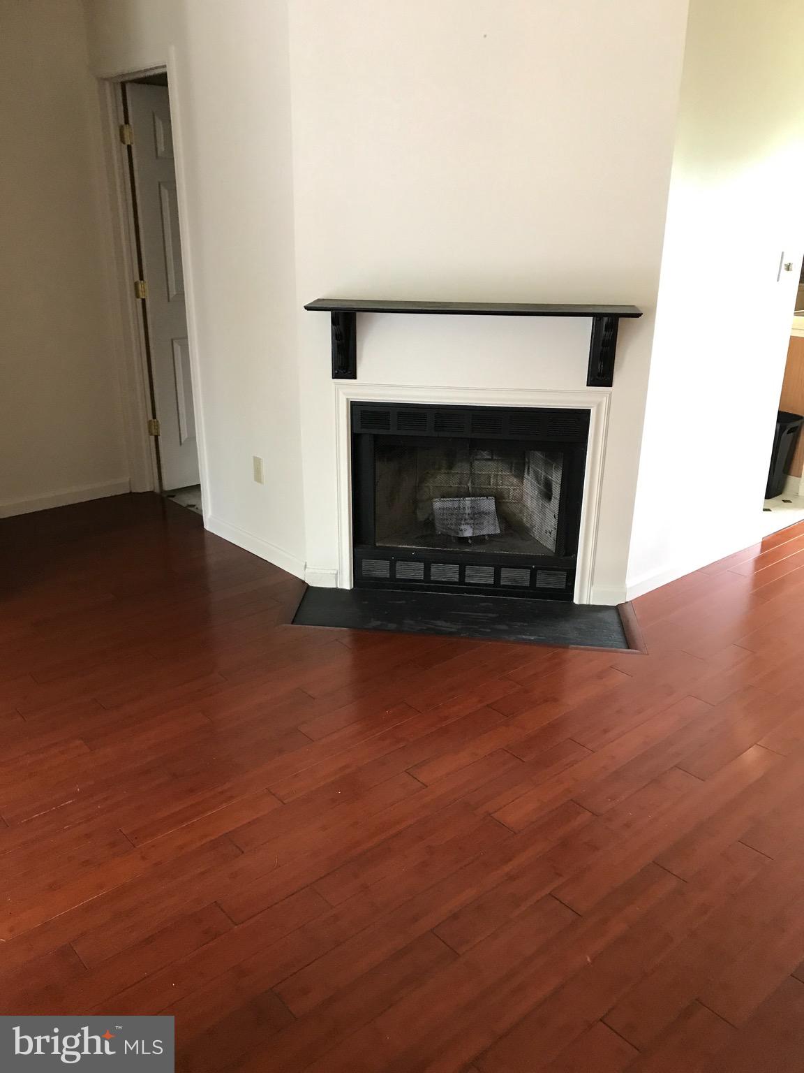 903 Christopher Drive Reading, PA 19610 - Photo 3 of 10 an empty room with a fireplace