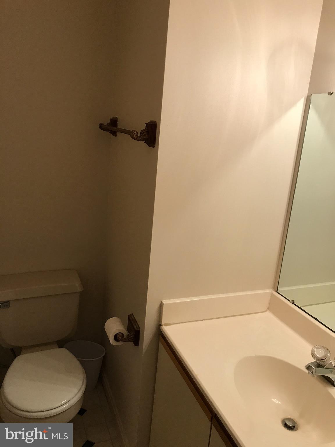 903 Christopher Drive Reading, PA 19610 - Photo 8 of 10 a bathroom with a sink and toilet