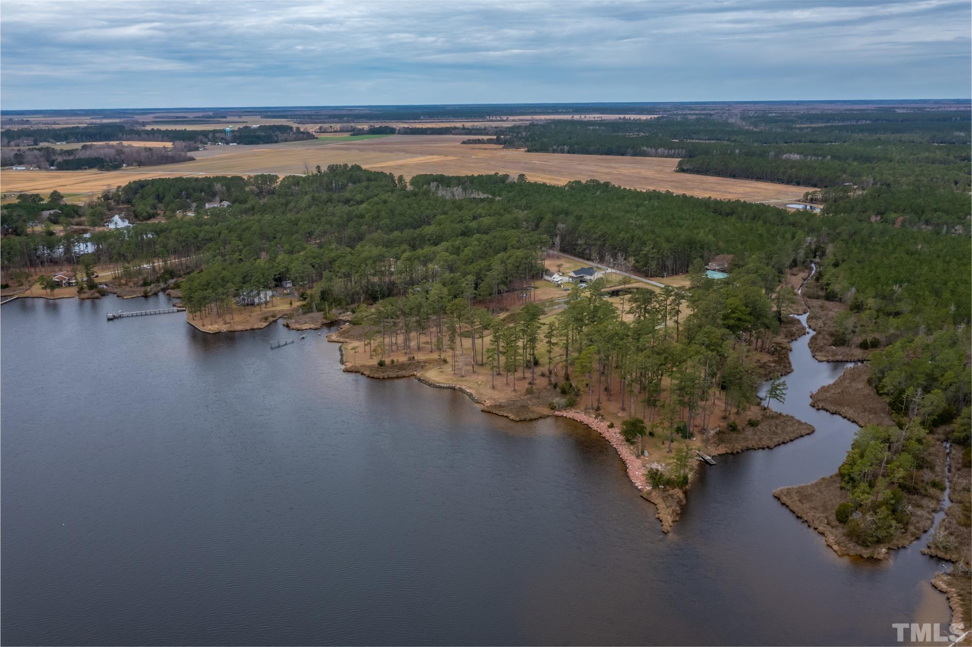307 Griggs Road Vandemere, NC 28587 - Photo 12 of 45 a view of a lake with a mountain
