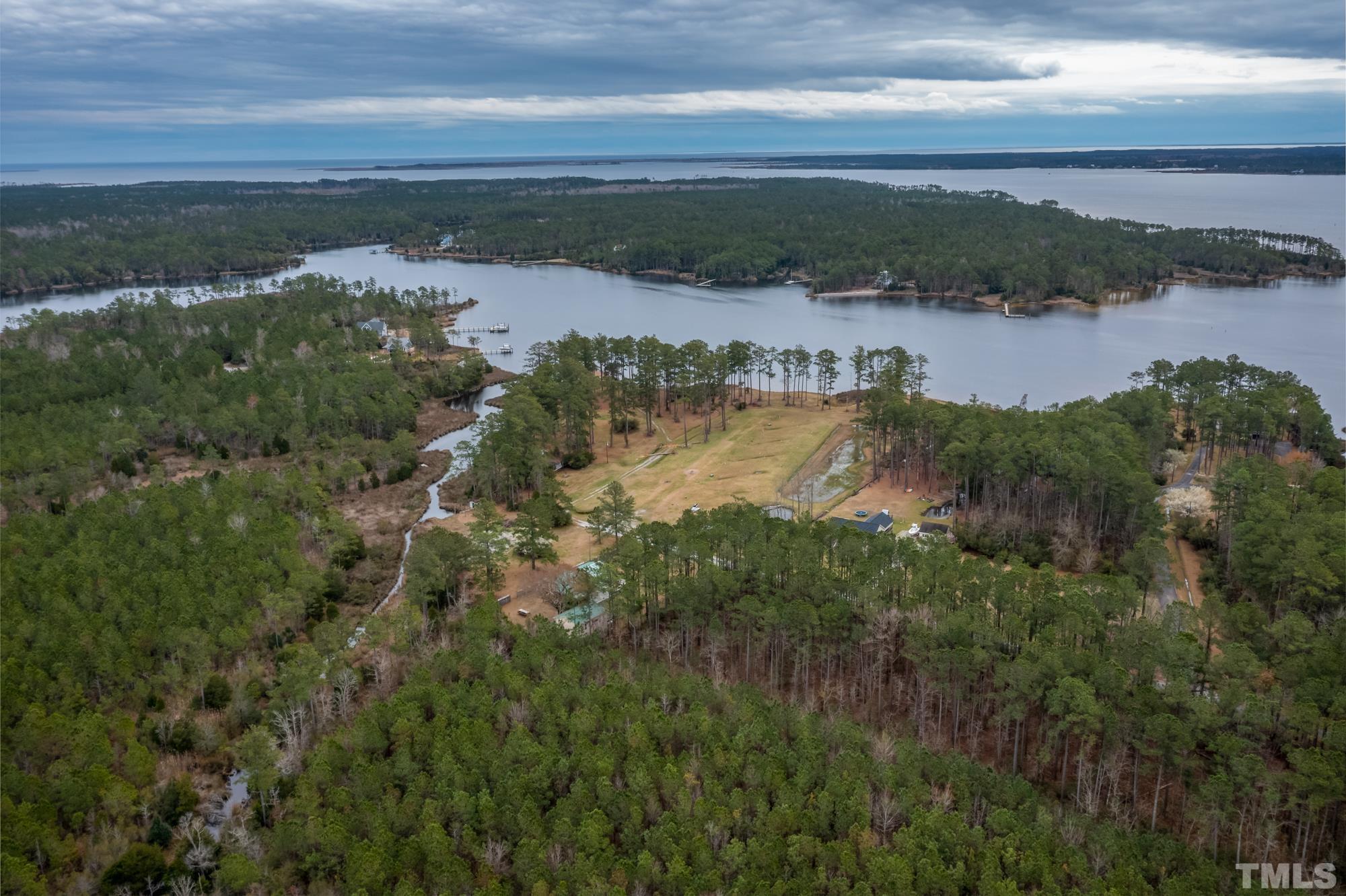 307 Griggs Road Vandemere, NC 28587 - Photo 20 of 45 a view of a lake from a yard