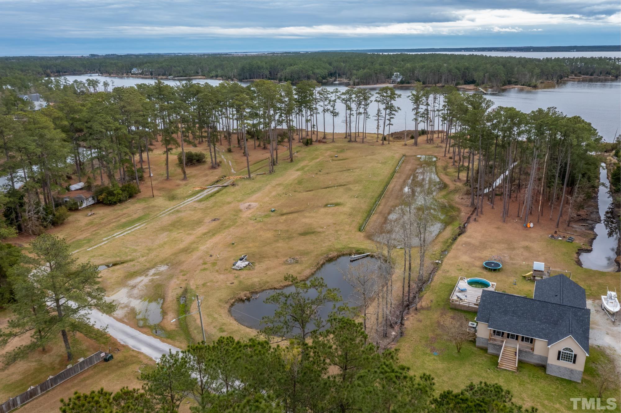 307 Griggs Road Vandemere, NC 28587 - Photo 2 of 45 a view of a lake in middle of the town