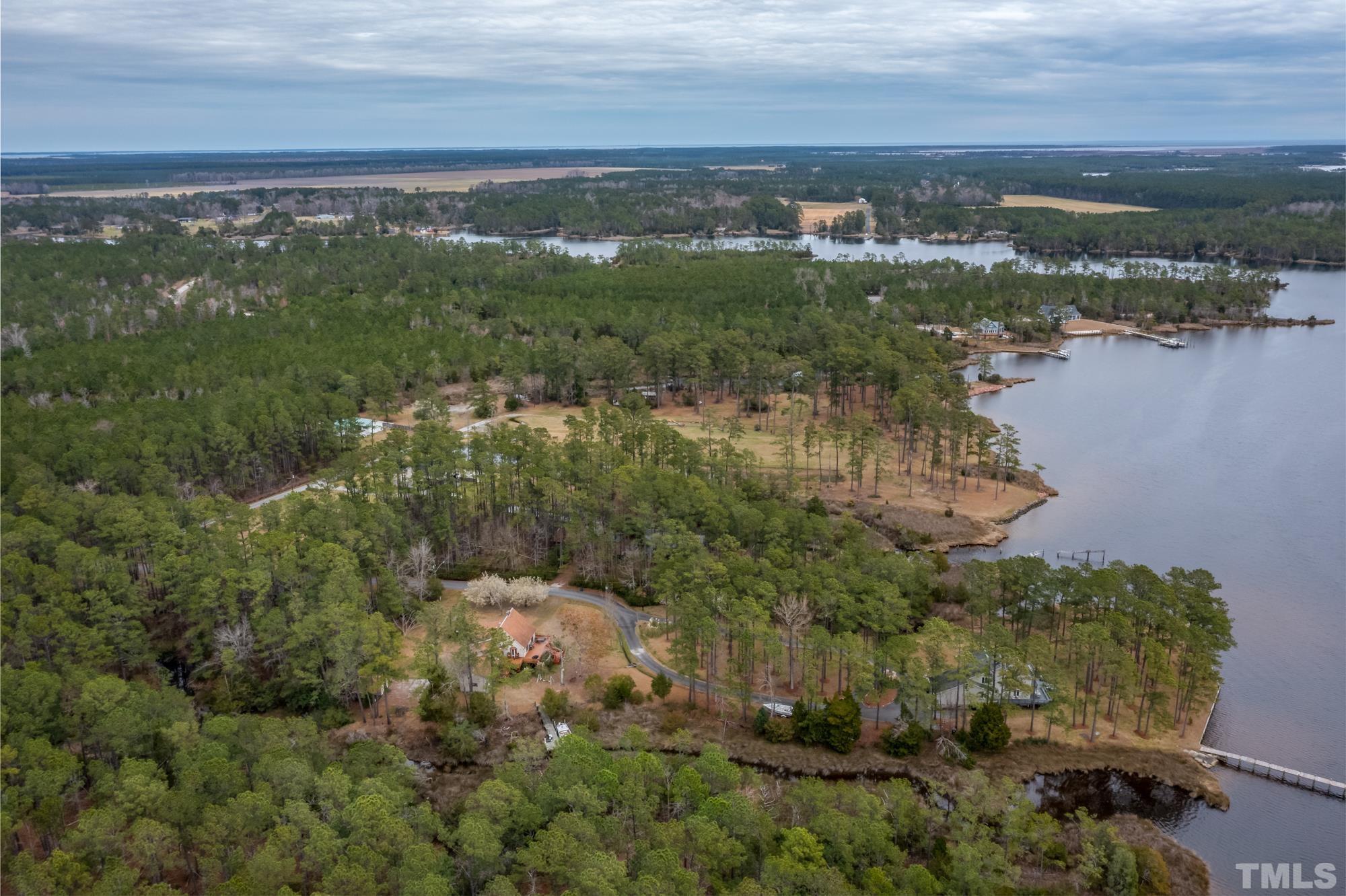 307 Griggs Road Vandemere, NC 28587 - Photo 22 of 45 an aerial view of residential building and lake