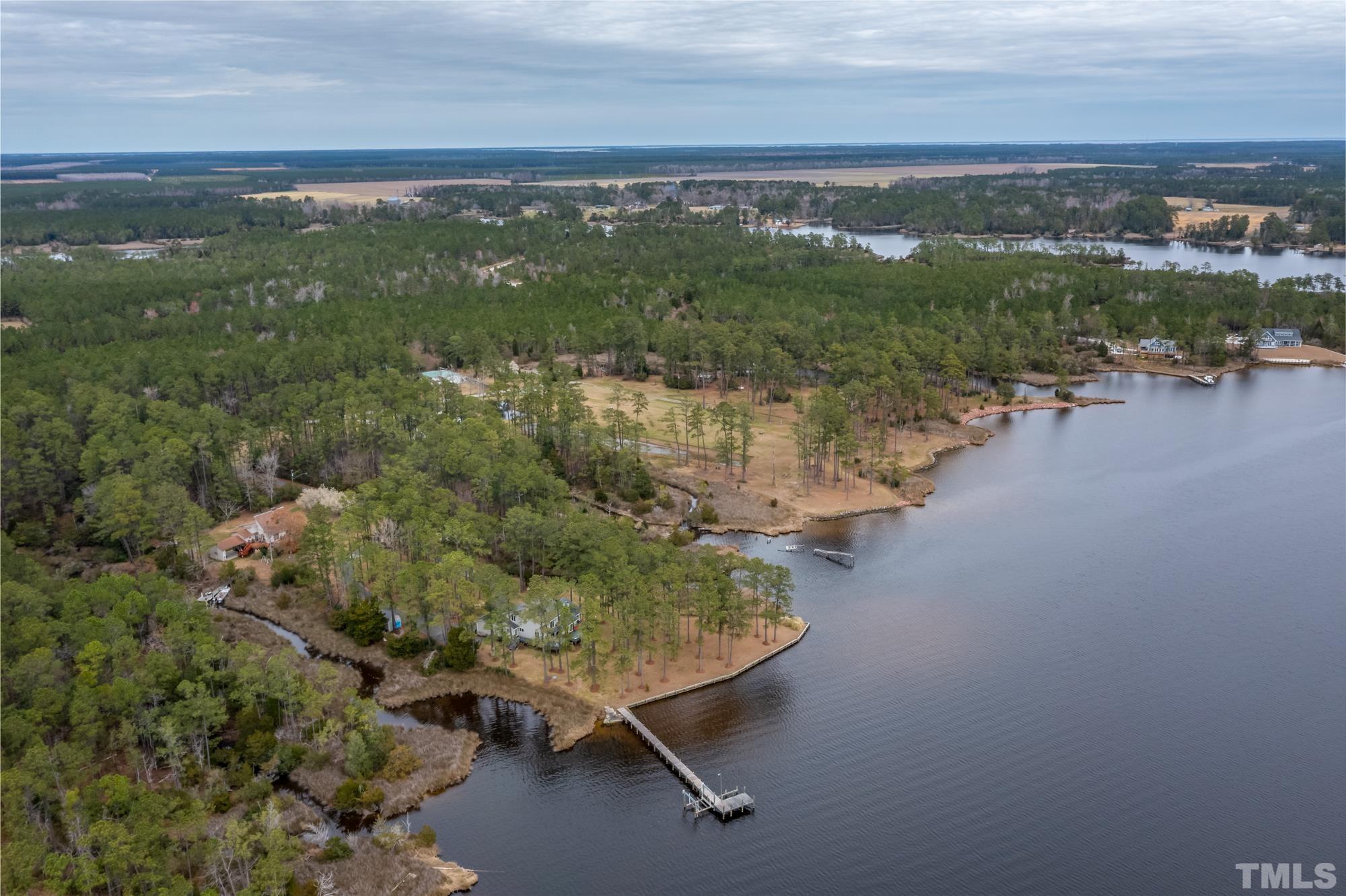 307 Griggs Road Vandemere, NC 28587 - Photo 24 of 45 a view of a lake with a mountain