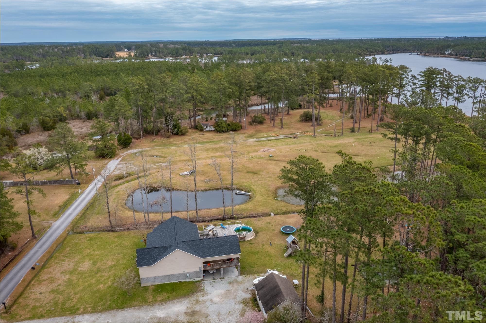 307 Griggs Road Vandemere, NC 28587 - Photo 3 of 45 a view of a swimming pool with a patio