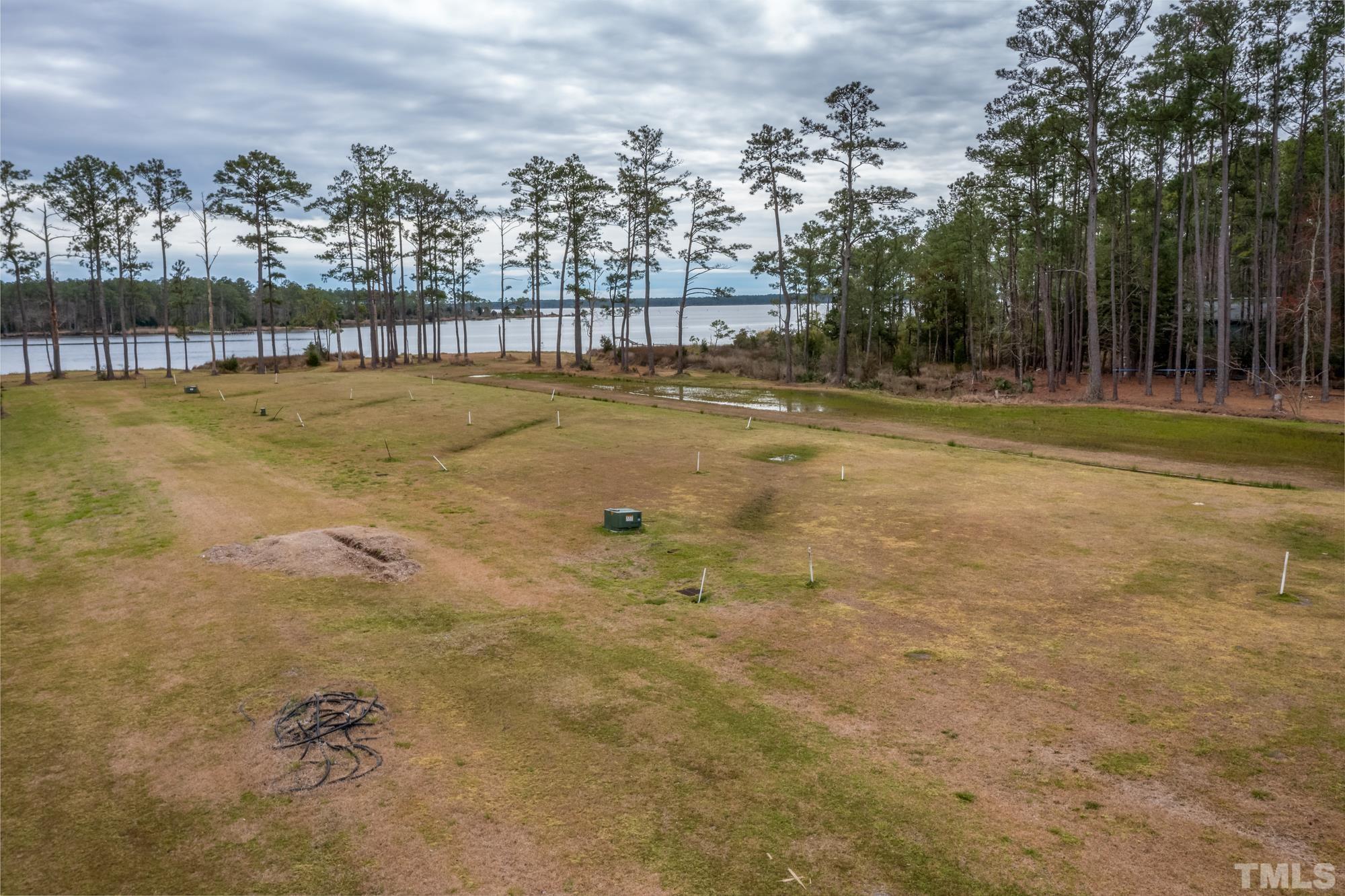 307 Griggs Road Vandemere, NC 28587 - Photo 32 of 45 a view of swimming pool with outdoor seating and yard in the back