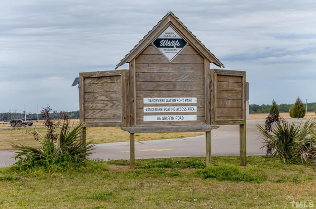 a view of a swimming pool with lounge chairs