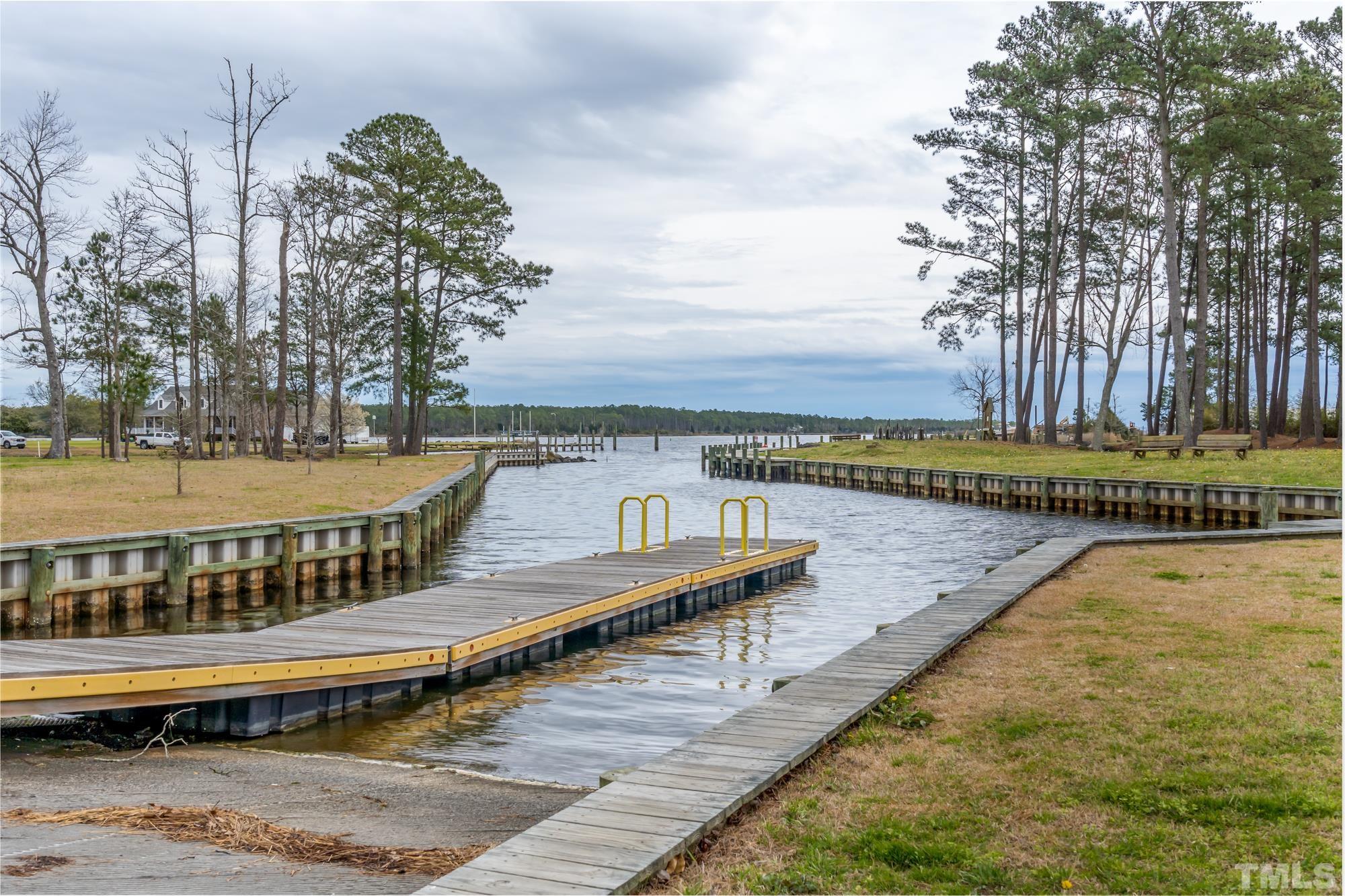 307 Griggs Road Vandemere, NC 28587 - Photo 40 of 45 a view of a swimming pool with lounge chairs