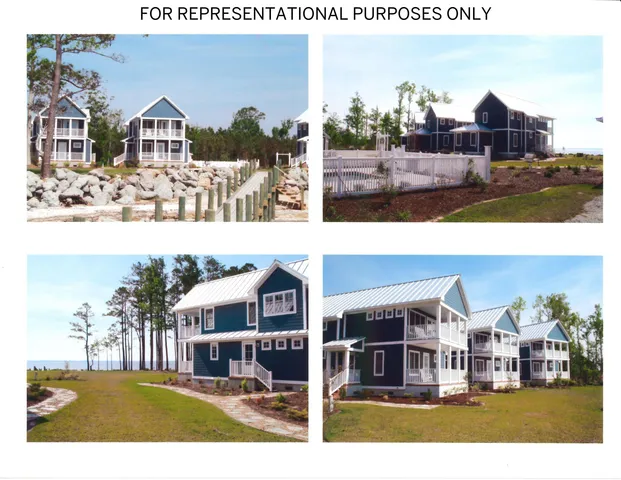 a view of a house with a big yard and large trees