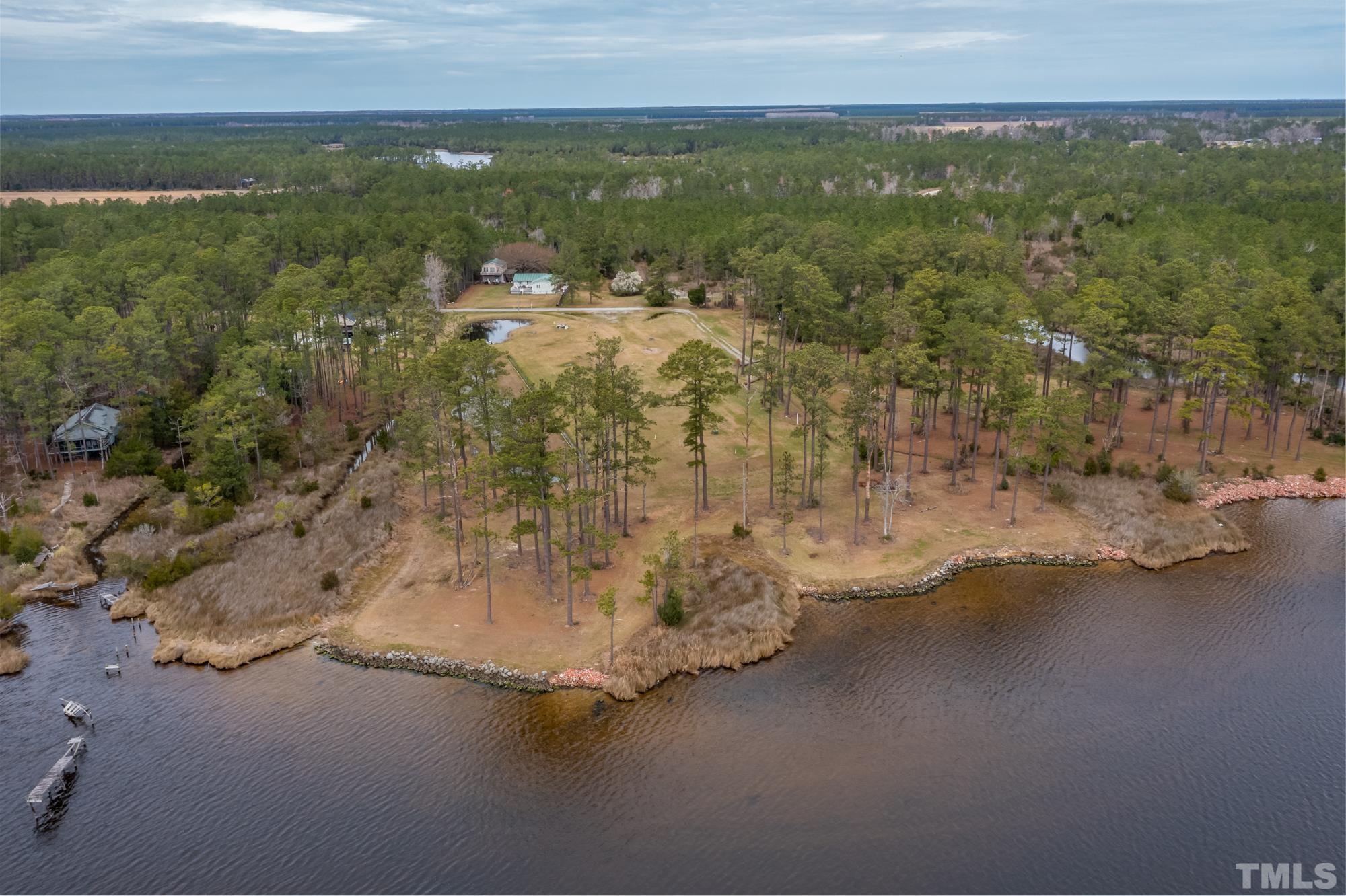307 Griggs Road Vandemere, NC 28587 - Photo 5 of 45 a view of a lake with a mountain in the background