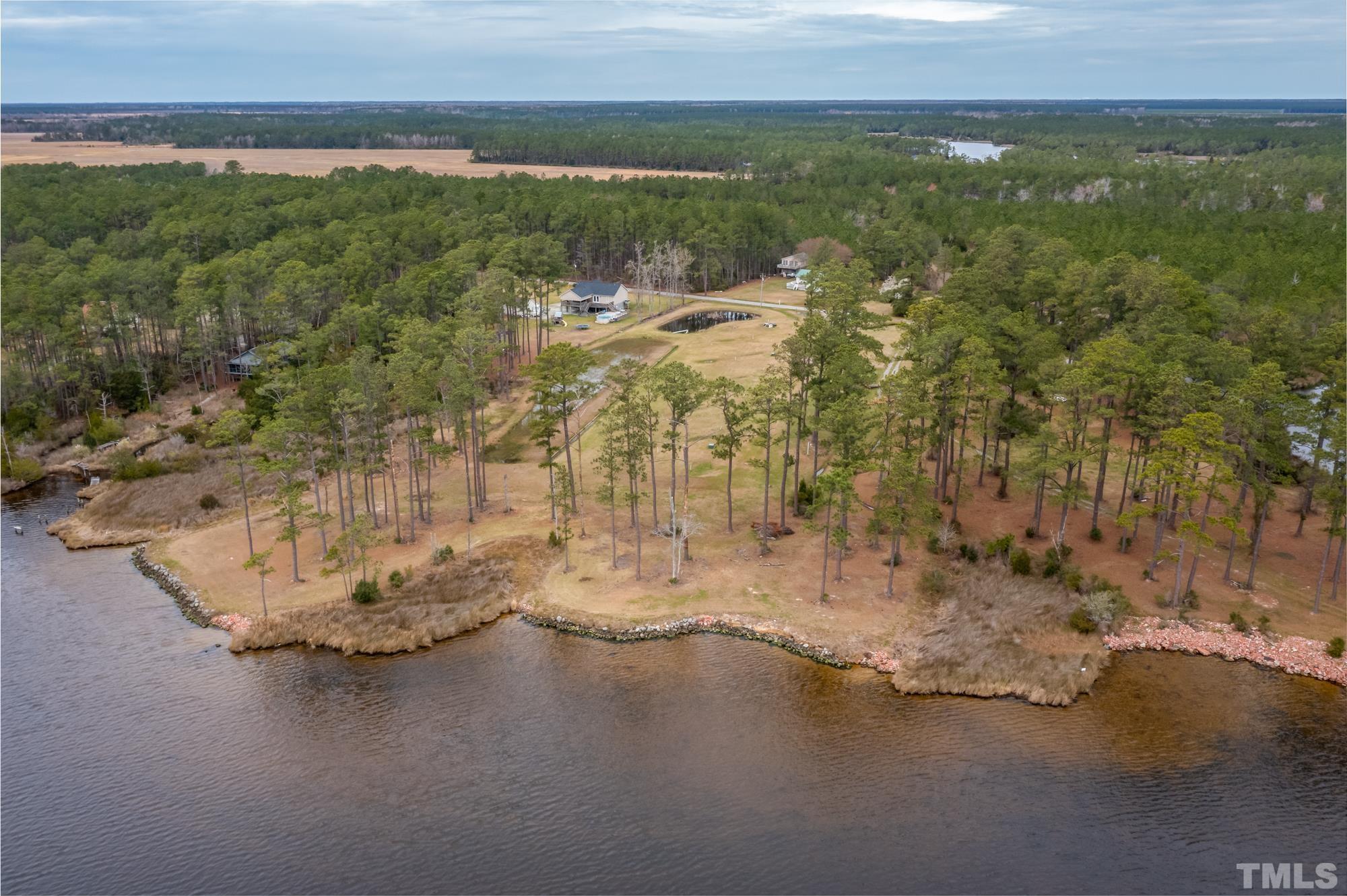 307 Griggs Road Vandemere, NC 28587 - Photo 6 of 45 a view of a lake with a mountain