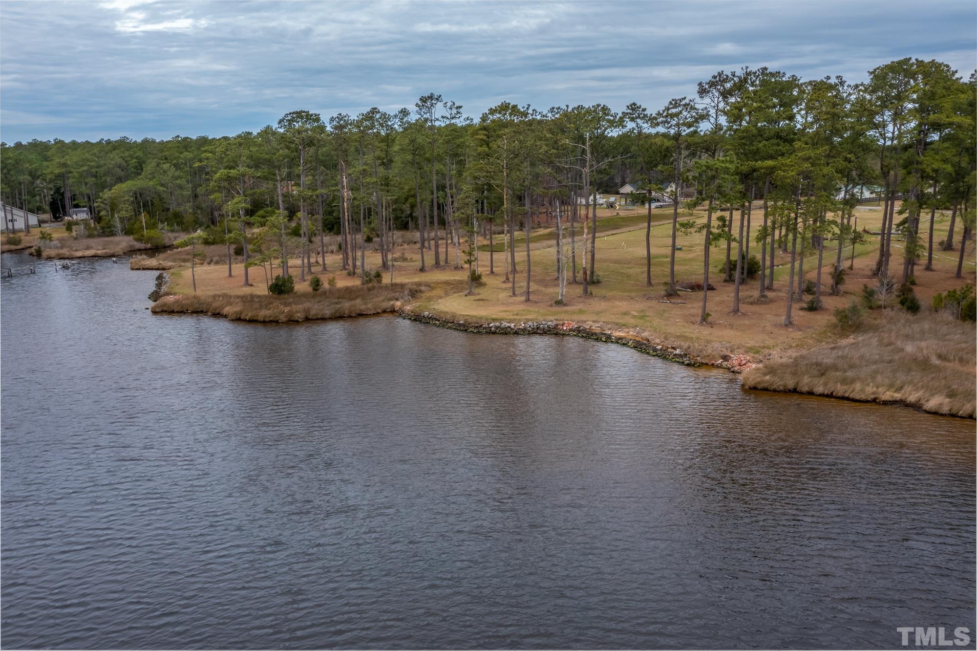 307 Griggs Road Vandemere, NC 28587 - Photo 9 of 45 a view of a lake with houses