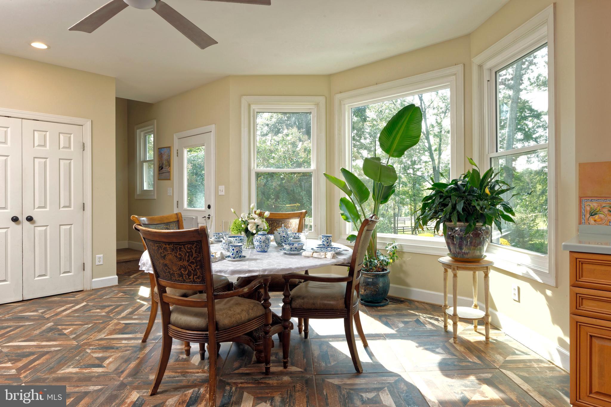 36775 Leith Lane Middleburg, VA 20117 - Photo 12 of 70 a view of a dining room with furniture window and wooden floor