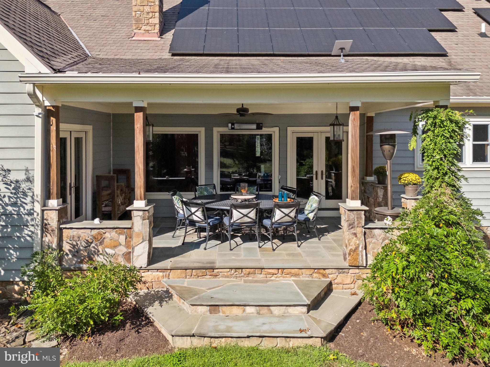 36775 Leith Lane Middleburg, VA 20117 - Photo 35 of 70 a view of a patio with a table and chairs